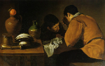 Dos jóvenes a la mesa